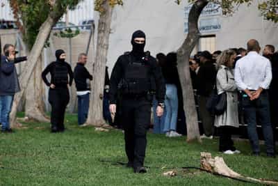 Image for Major trial of Olympiacos FC chairman, soccer fans, opens in Greece over sports violence