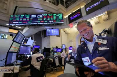 Image for US stocks hit record again on Trump win, Treasury yields dip