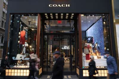 Image for Coach parent Tapestry cuts profit forecast on tariff hit, shares slump