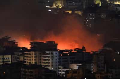 Image for Israeli airstrikes pound Beirut suburb, Hezbollah warns Israelis