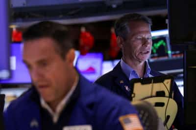 Image for Stocks mixed, gold hits record as US government shuts down