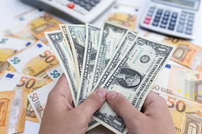 Image for Dollar gains ahead of inflation data, euro falls after ECB