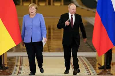Image for Merkel, Putin clash over Navalny on her last trip to Russia