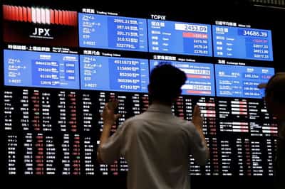 Image for Nikkei ends lower on yen strength, profit-taking after crossing 44,000
