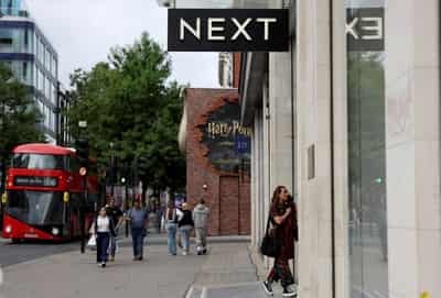 Image for UK retailer Next wins appeal to pay warehouse staff higher basic pay