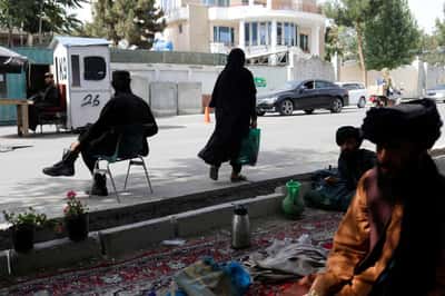 Image for Half of Afghan women rarely leave home as Taliban restrictions deepen, UN agency says