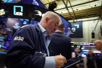 Image for US stock index futures rise on Middle East peace hopes, AI optimism