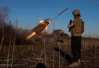 Image for Ukraine's top commander says troops standing firm outside key city