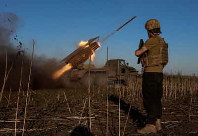 Image for Ukraine's top commander says troops standing firm outside key city