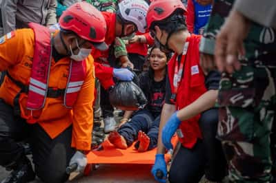Image for Families desperate for news as 129 still missing four days after capsize of ship in Indonesia's Java Sea