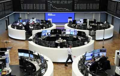 Image for Stocks fall, bonds and gold gain as Russia threats add to Fed jitters