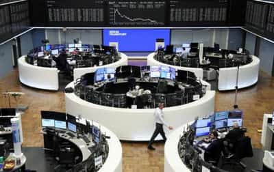 Image for Stocks fall, bonds and gold gain as Russia threats add to Fed jitters