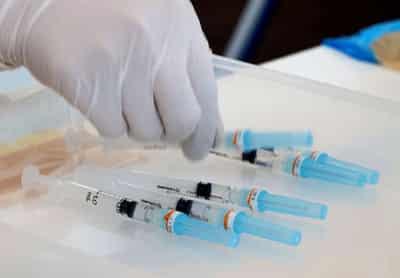 Image for Japan eyes mixed use of COVID-19 shots to speed vaccine rollout