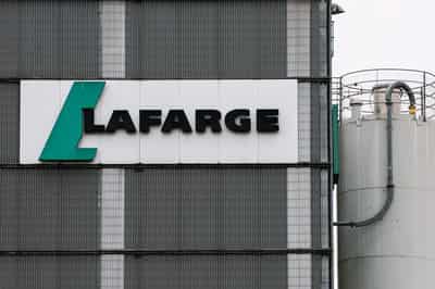 Image for French cement maker Lafarge faces trial on charges of financing jihadists in Syria