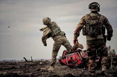 Image for South Africa says most of a group of 17 men lured into fighting for Russia set to return home