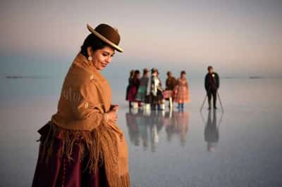 Image for Bolivian boy turns photographer on iconic salt flats – with help from a dinosaur