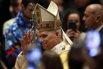 Image for Pope Leo, on Christmas Eve, says denying help to poor is rejecting God