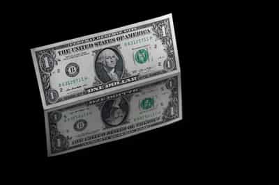 Image for Dollar set for best week in a month on cautious Fed outlook for 2025