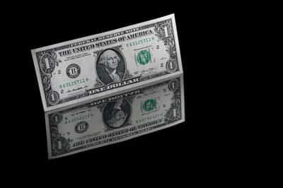 Image for Dollar set for best week in a month on cautious Fed outlook for 2025