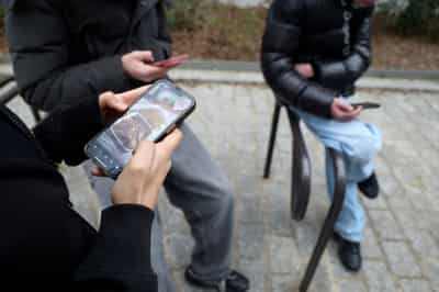 Image for Switch off and read, France's Macron tells teenagers