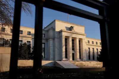 Image for Stocks edge up before Fed minutes, dollar off 1-month low