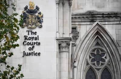 Image for UK court temporarily blocks removal of asylum seeker under UK-France returns deal