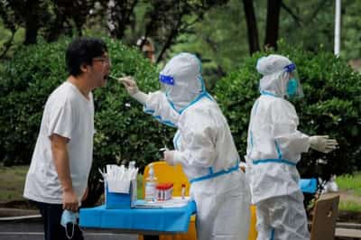 Image for China battles karaoke COVID cluster in Shanghai among other outbreaks