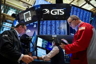 Image for Dollar slips, stocks edge up before tight US election