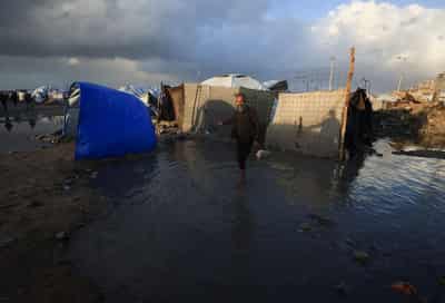 Image for Six dead as Gaza’s displaced struggle to hold ground in torrential rain