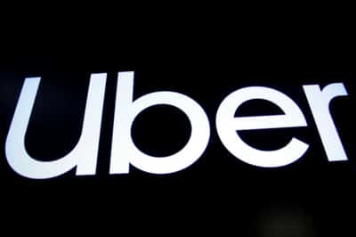 Image for French Uber drivers to earn more than $8 per ride after union deal