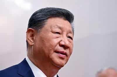 Image for China's Xi projects power at military parade with Putin and Kim