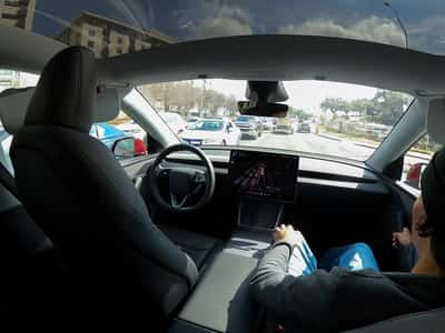 Image for Tesla's once-bullish tone on robotaxis shifts  