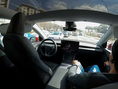 Image for Tesla's once-bullish tone on robotaxis shifts  