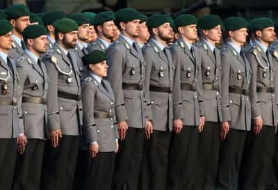 Image for Germany works to clarify new rules on fighting-age men leaving country