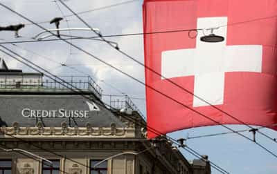 Image for Credit Suisse shares hit record low after report bank is looking to raise cash