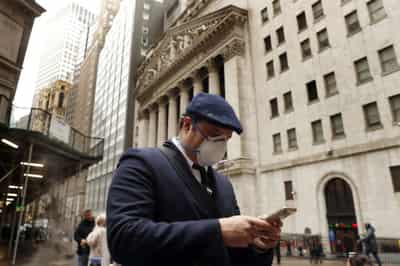Image for Stocks slip from record highs before U.S. bank earnings