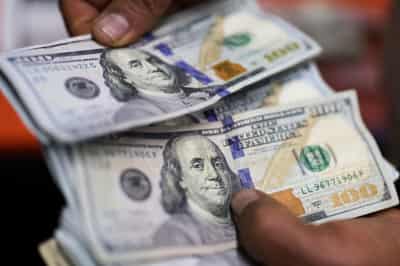 Image for Dollar strengthens against peers as Trump rekindles trade tensions; bitcoin hits record high