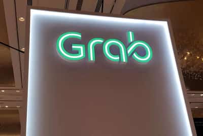 Image for Exclusive-Grab to cut more costs amid economic chill