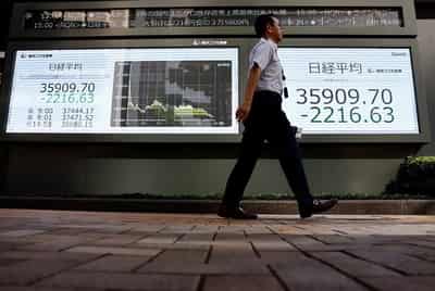 Image for Wall Street follows world stocks higher ahead of central bank actions