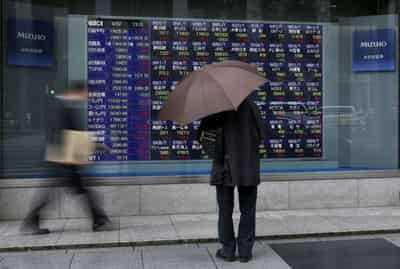 Image for Stocks slide, dollar holds ground as U.S. rate hike looms