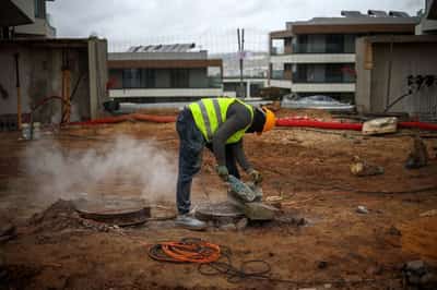 Image for Analysis-Portugal's migrant curbs hit construction firms working to solve housing crisis