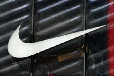 Image for Nike sales crimped by pandemic, shipping issues; forecast disappoints