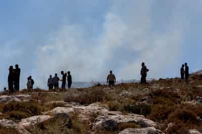 Image for Israeli settlers impeded firefighting near Christian West Bank village, Palestinians say