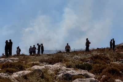 Image for Israeli settlers impeded firefighting near Christian West Bank village, Palestinians say