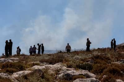 Image for Israeli settlers impeded firefighting near Christian West Bank village, Palestinians say