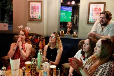 Image for Britons buy clothes, fans and booze amid the World Cup heat