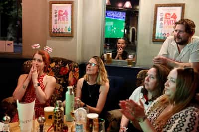 Image for Britons buy clothes, fans and booze amid the World Cup heat