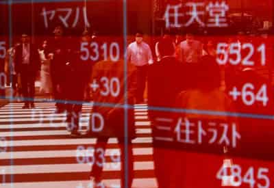 Image for Stocks tiptoe higher before Fed, yen intervention alarms flare