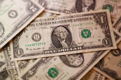 Image for Dollar trading near multi-month lows, restrained by debt nerves