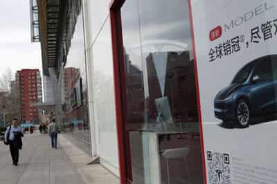 Image for Tesla's June China-made EV sales see first rise in 9 months, but quarterly fall continues
